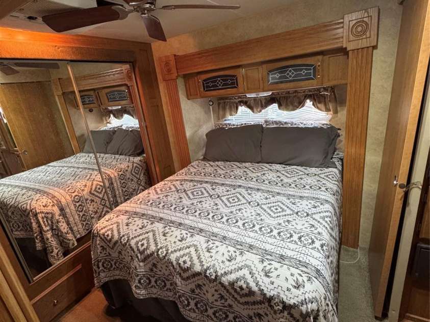 111 Club House Extension, New London, NC 28127.  MLS# CAR4295285, YatesRealty ID 3757. Bedroom large enough to walk around the bed!