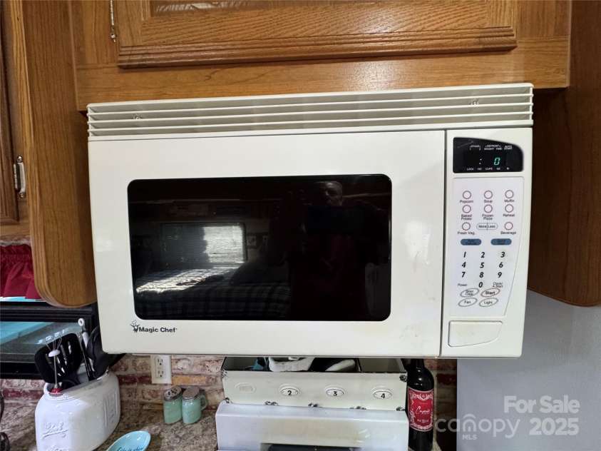 111 Club House Extension, New London, NC 28127.  MLS# CAR4295285, YatesRealty ID 3757. Microwave built-in