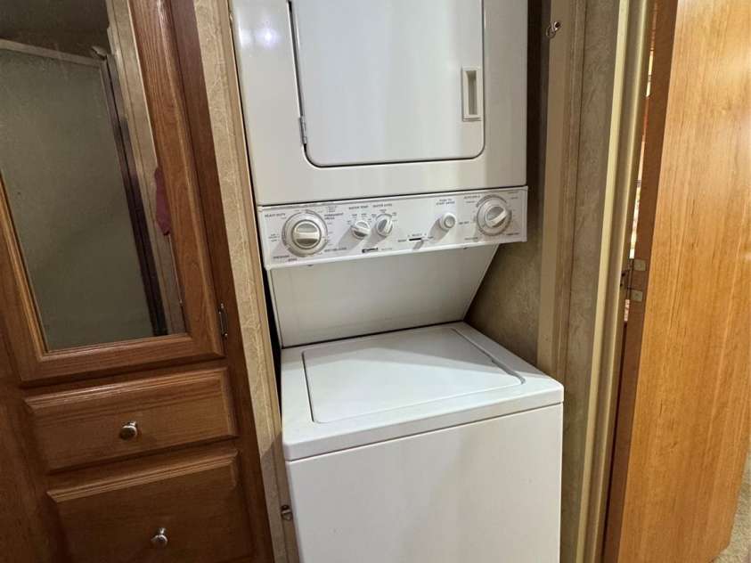 111 Club House Extension, New London, NC 28127.  MLS# CAR4295285, YatesRealty ID 3757. Washer Dryer Combo, many camper homes do not include these