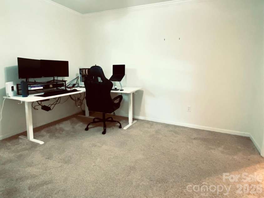 417 Olmsted Park Place, Charlotte, NC 28203.  MLS# CAR4421577, YatesRealty ID 37579. This room is currently used as an office
