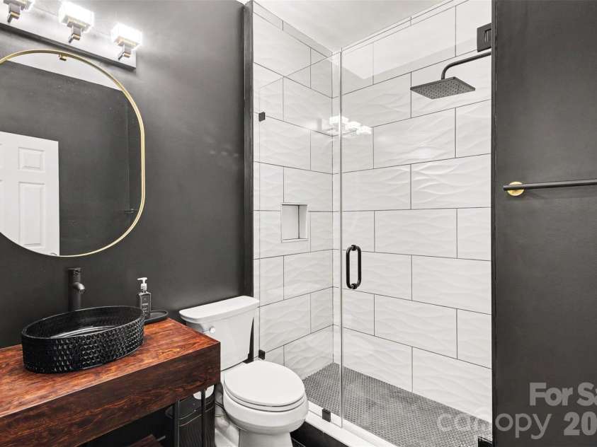 3324 Brackhill Street, Davidson, NC 28036.  MLS# CAR4428889, YatesRealty ID 37582. Full bathroom, large shower, downstairs