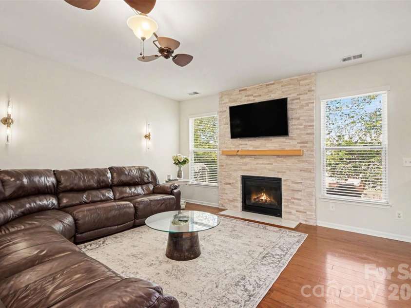 3324 Brackhill Street, Davidson, NC 28036.  MLS# CAR4428889, YatesRealty ID 37582. Great room with updated fireplace