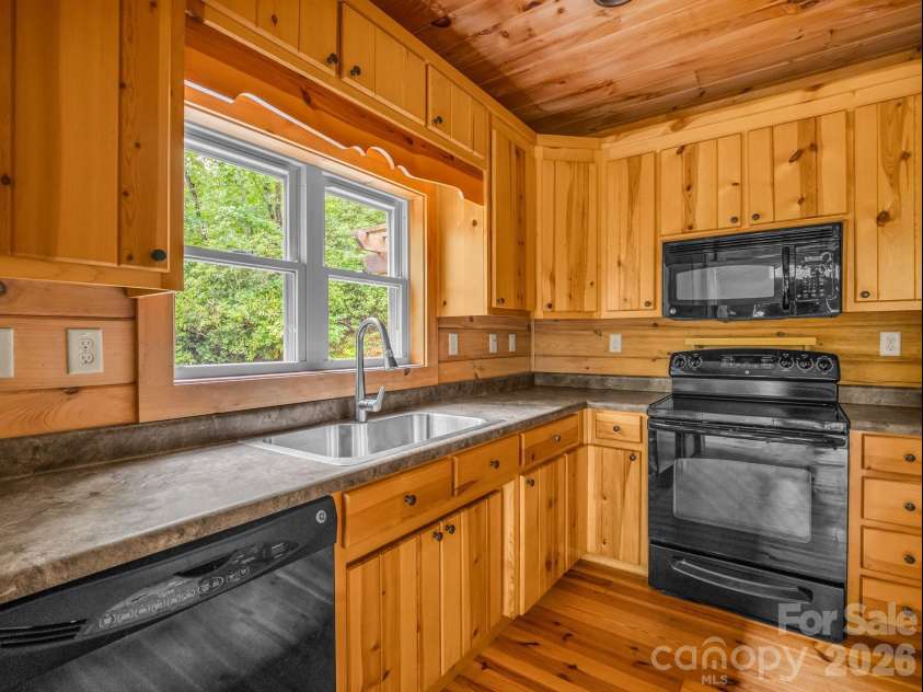 160 Sweetwater Ridge Road, Balsam Grove, NC 28708.  MLS# CAR4405149, YatesRealty ID 37583. 