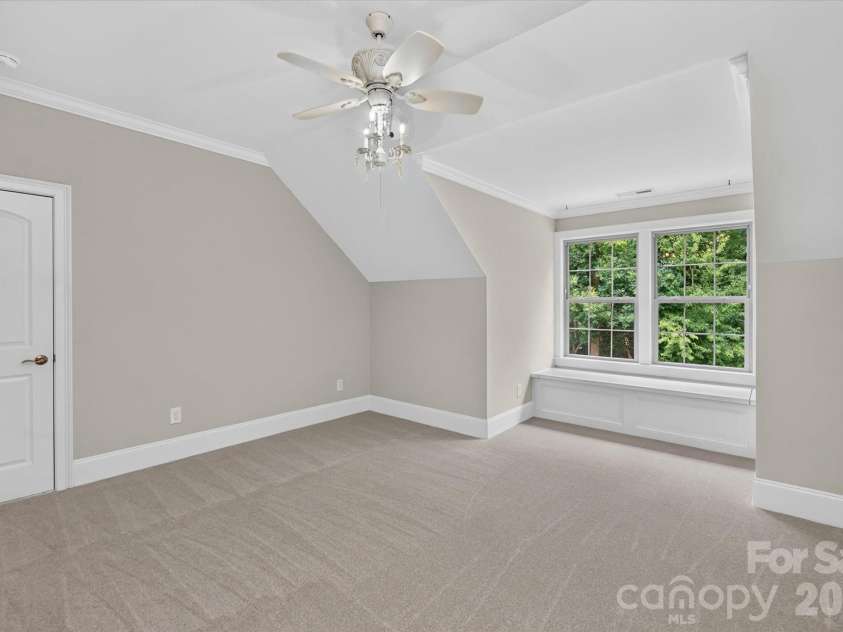 2020 Sherringham Way, Waxhaw, NC 28173.  MLS# CAR4390761, YatesRealty ID 37590. Bedroom with a window seat
