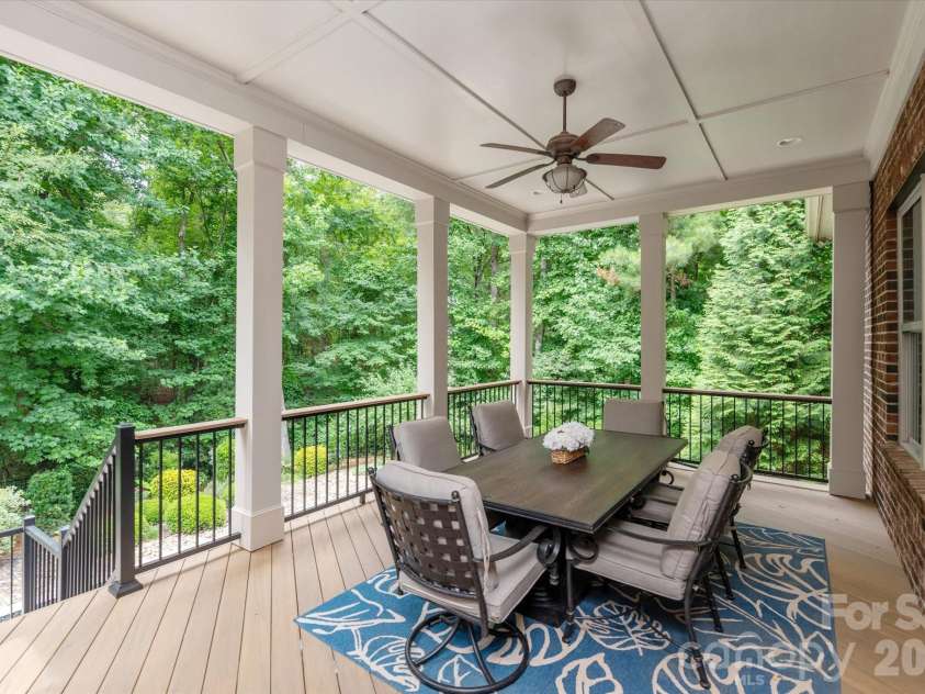 2020 Sherringham Way, Waxhaw, NC 28173.  MLS# CAR4390761, YatesRealty ID 37590. Covered porch overlooking the pool
