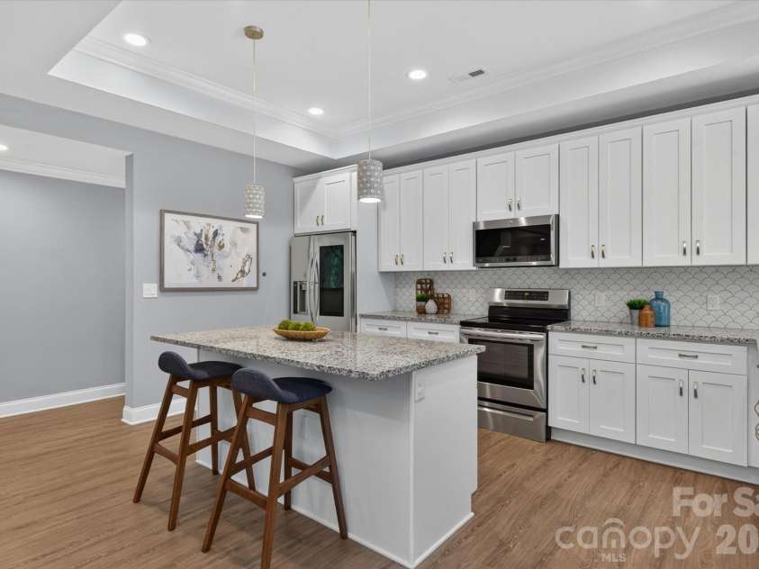 2020 Sherringham Way, Waxhaw, NC 28173.  MLS# CAR4390761, YatesRealty ID 37590. Full kitchen in basement  plus second laundry room functions an an apartment