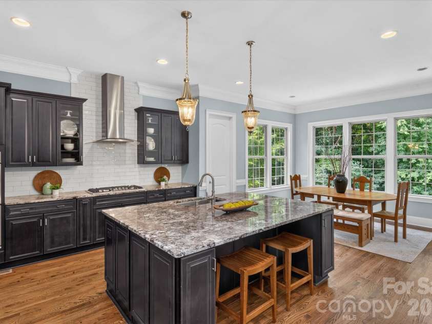 2020 Sherringham Way, Waxhaw, NC 28173.  MLS# CAR4390761, YatesRealty ID 37590. Huge granite island with seating