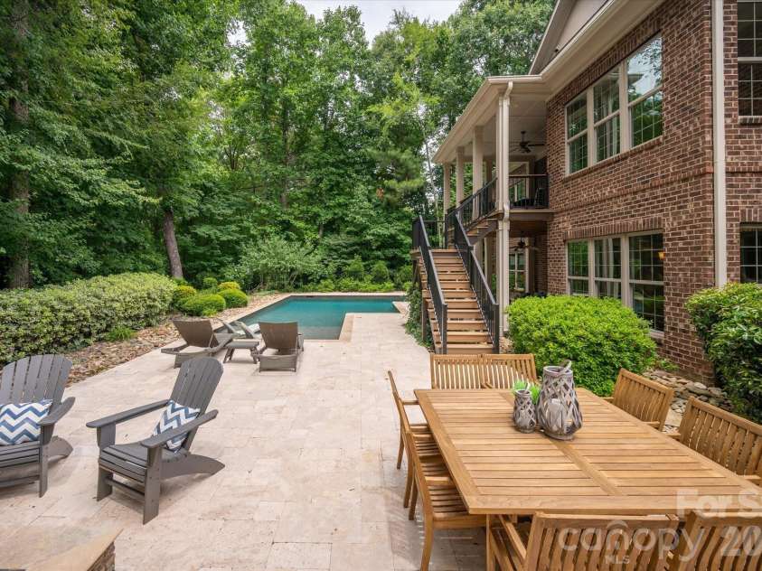 2020 Sherringham Way, Waxhaw, NC 28173.  MLS# CAR4390761, YatesRealty ID 37590. Spacious travertine deck