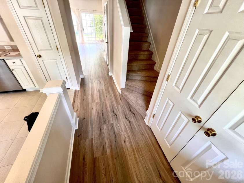 6876 Rothchild Drive, Charlotte, NC 28270.  MLS# CAR4388708, YatesRealty ID 37594. Down Stairs Hall - NEW FLOORS