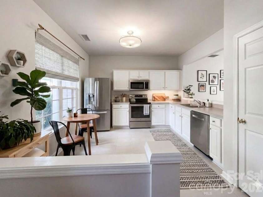 6876 Rothchild Drive, Charlotte, NC 28270.  MLS# CAR4388708, YatesRealty ID 37594. Kitchen - Digitally Staged