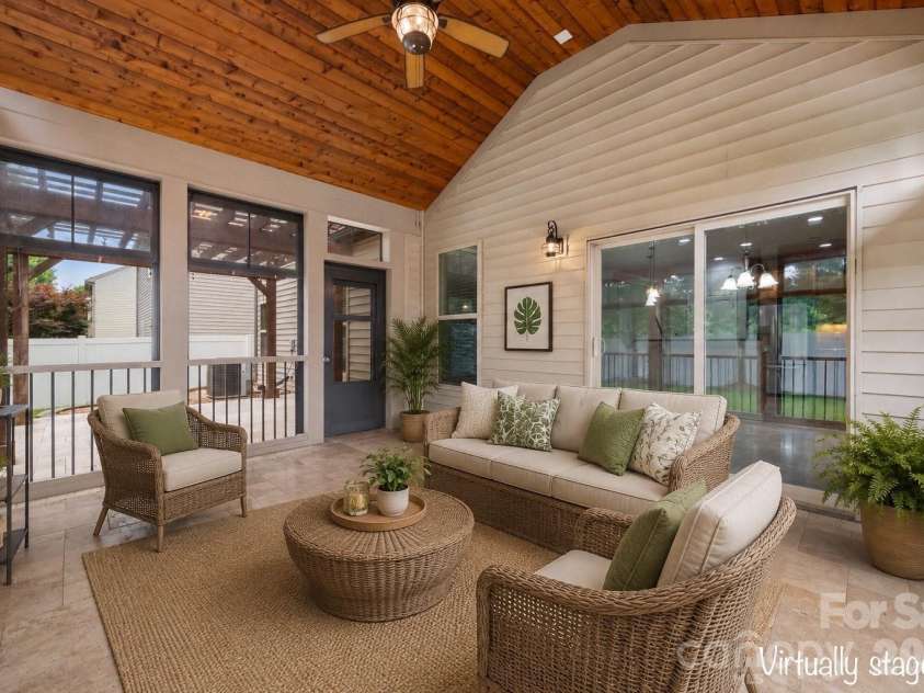523 Danson Drive, Fort Mill, SC 29715.  MLS# CAR4392036, YatesRealty ID 37595. Three season room - virtually staged