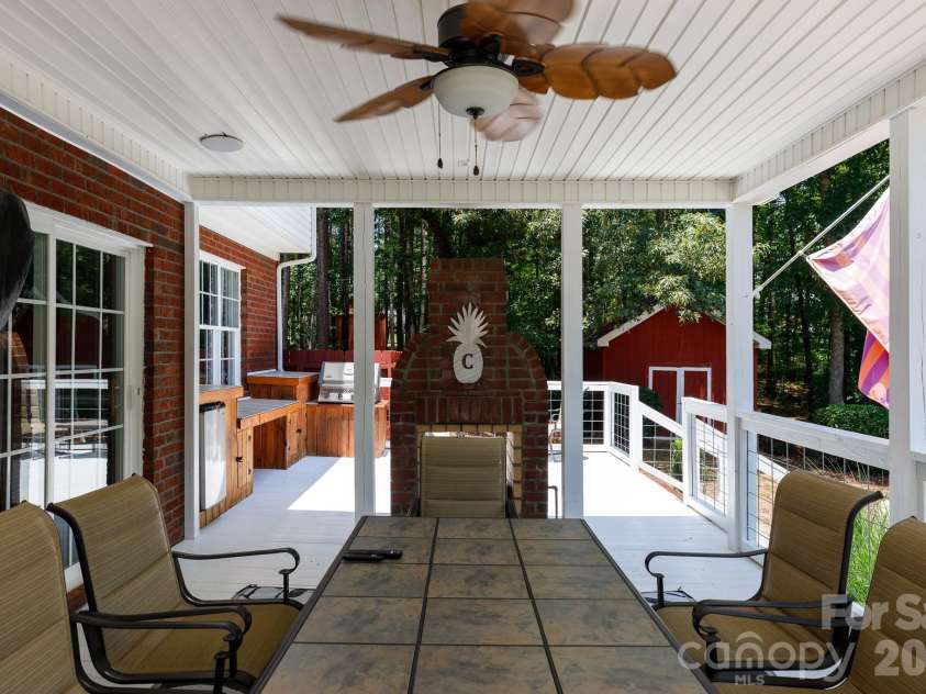 3009 Mamoth Oak Drive, Lancaster, SC 29720.  MLS# CAR4393141, YatesRealty ID 37598. Back yard entertainment area