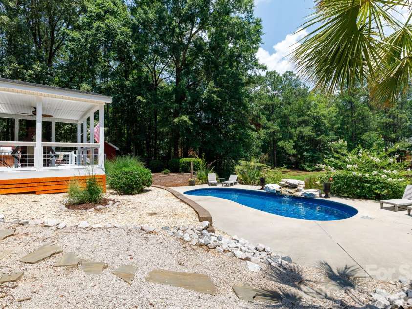3009 Mamoth Oak Drive, Lancaster, SC 29720.  MLS# CAR4393141, YatesRealty ID 37598. Side view of backyard oasis