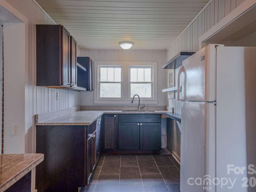 501 Fairview Road, Asheville, NC 28803.  MLS# CAR4393611, YatesRealty ID 37603. Kitchen