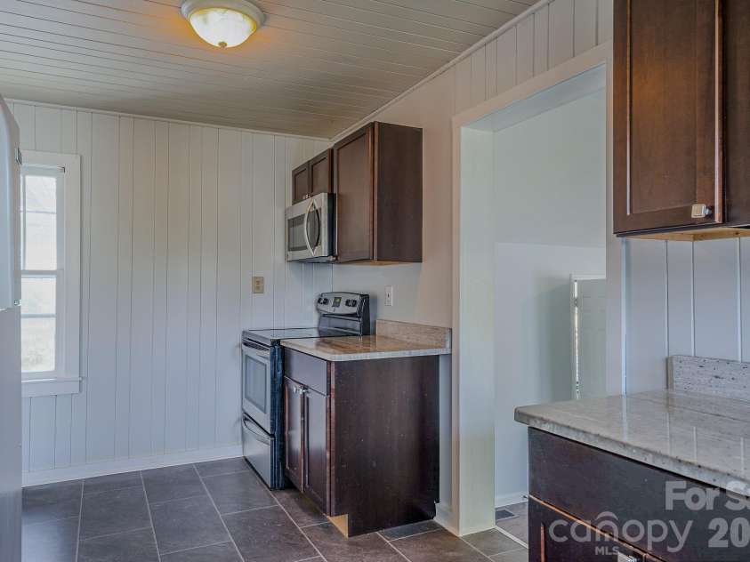 501 Fairview Road, Asheville, NC 28803.  MLS# CAR4393611, YatesRealty ID 37603. Kitchen