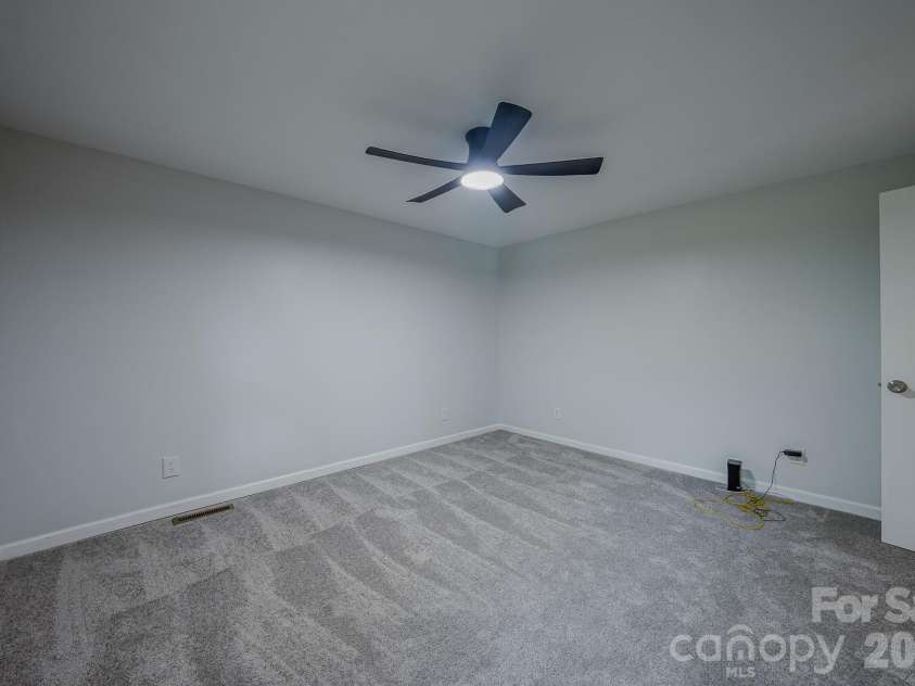 501 Fairview Road, Asheville, NC 28803.  MLS# CAR4393611, YatesRealty ID 37603. Primary Bedroom