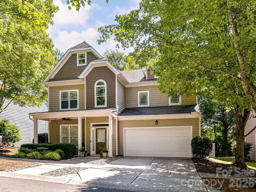18814 Coachmans Trace, Cornelius, NC 28031.  MLS# CAR4399708, YatesRealty ID 37607. Beautifully maintained 4 bedroom, 2.5 bath home with timeless curb appeal, mature shade trees, and an inviting covered front porch in the charming Glenridge neighborhood.