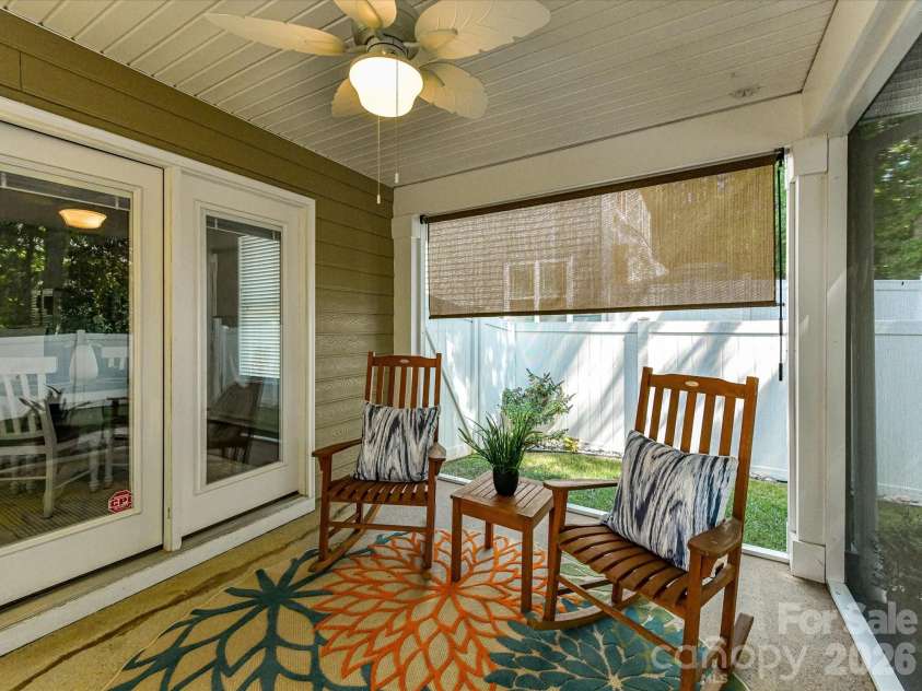 18814 Coachmans Trace, Cornelius, NC 28031.  MLS# CAR4399708, YatesRealty ID 37607. Relax year-round on the screened porch overlooking the private fenced backyard, creating the perfect space for morning coffee or evening unwinding.