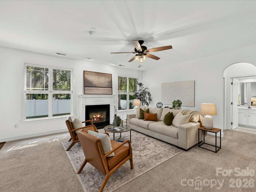 18814 Coachmans Trace, Cornelius, NC 28031.  MLS# CAR4399708, YatesRealty ID 37607. The expansive great room offers soaring ceilings, abundant natural light, and versatile space for gathering, relaxing, or entertaining.
