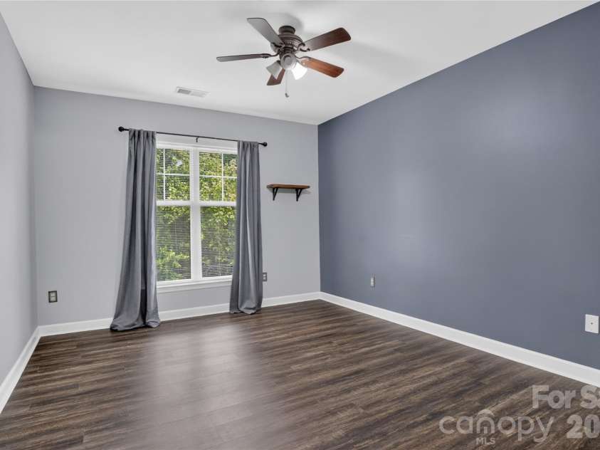 17221 Doe Valley Court, Cornelius, NC 28031.  MLS# CAR4383071, YatesRealty ID 37609. Primary bedroom