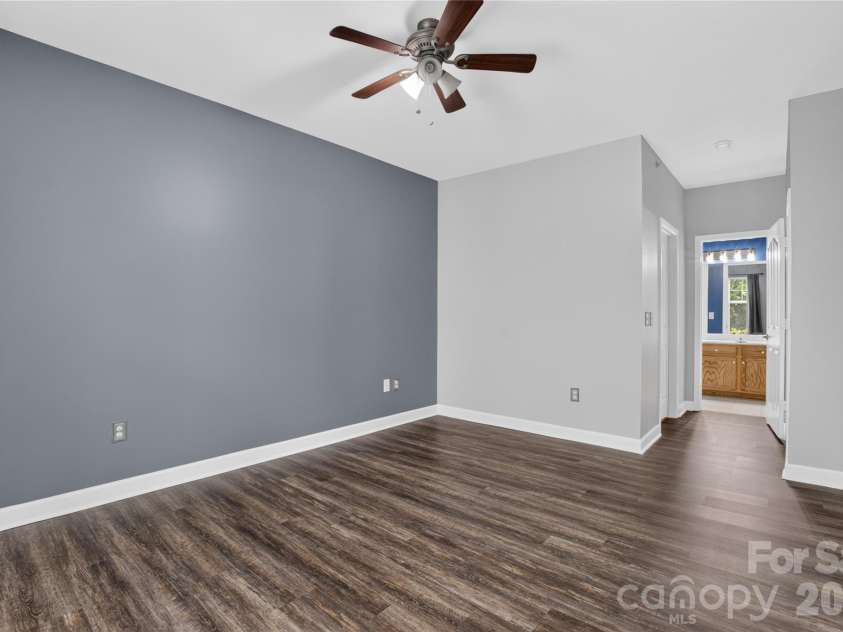 17221 Doe Valley Court, Cornelius, NC 28031.  MLS# CAR4383071, YatesRealty ID 37609. Primary bedroom