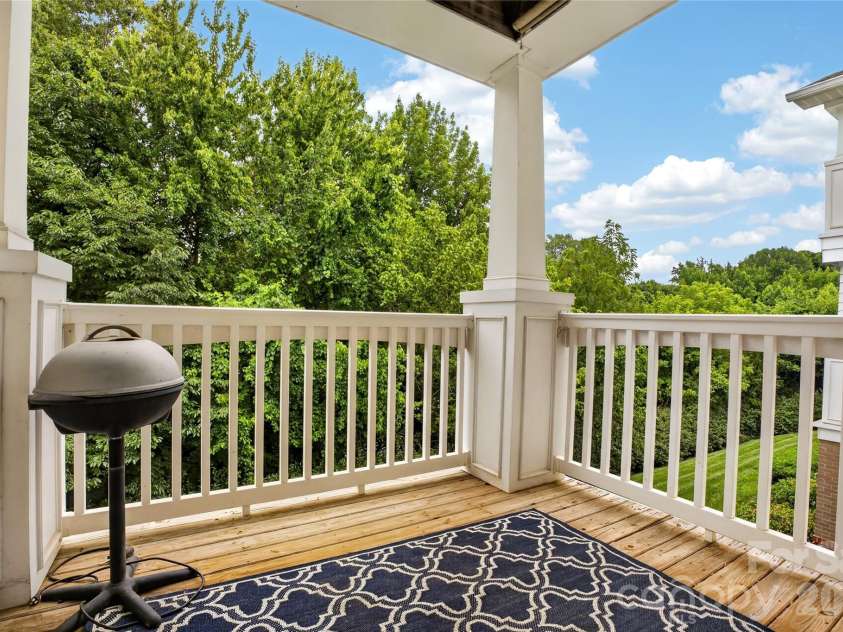 17221 Doe Valley Court, Cornelius, NC 28031.  MLS# CAR4383071, YatesRealty ID 37609. Private balcony with greenway right behind trees!