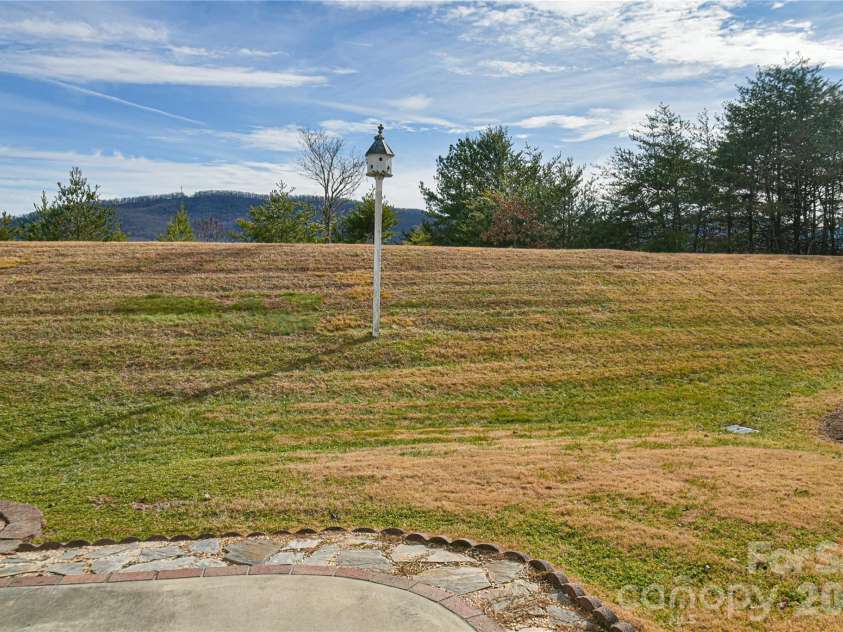 4 Heather Way, Candler, NC 28715.  MLS# CAR4355118, YatesRealty ID 3761. Backyard Views