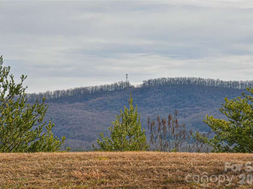 4 Heather Way, Candler, NC 28715.  MLS# CAR4355118, YatesRealty ID 3761. Backyard Views