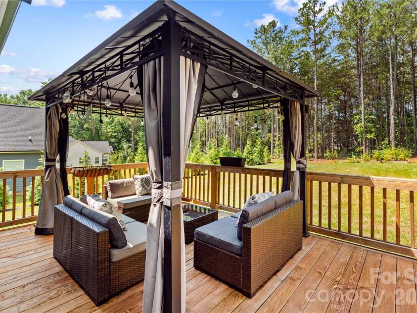 2512 Shuford Road, Lincolnton, NC 28092.  MLS# CAR4400936, YatesRealty ID 37610. Covered seating on the back deck