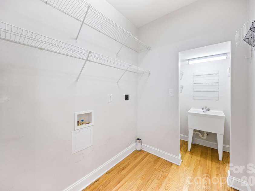 5355 Shannamara Drive, Matthews, NC 28104.  MLS# CAR4400014, YatesRealty ID 37611. Laundry room with utility sink