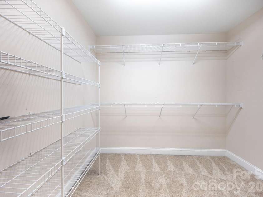 5355 Shannamara Drive, Matthews, NC 28104.  MLS# CAR4400014, YatesRealty ID 37611. Primary closet