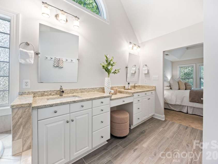 5355 Shannamara Drive, Matthews, NC 28104.  MLS# CAR4400014, YatesRealty ID 37611. Primary dual vanity