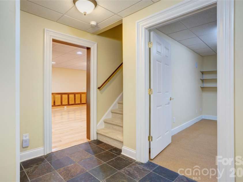 6015 Graburns Ford Drive, Charlotte, NC 28269.  MLS# CAR4402228, YatesRealty ID 37615. Basement entry