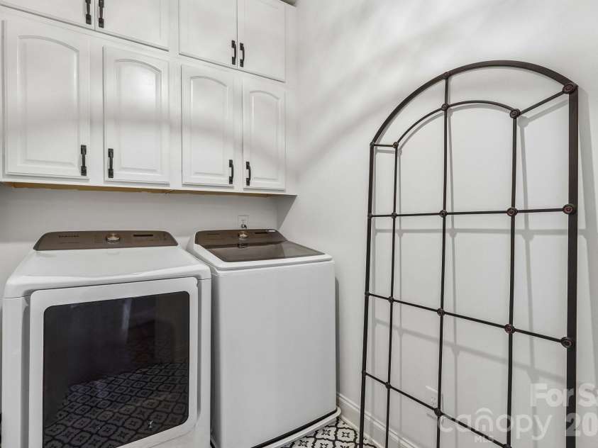 5401 Haynes Hall Place, Charlotte, NC 28270.  MLS# CAR4403065, YatesRealty ID 37623. Laundry