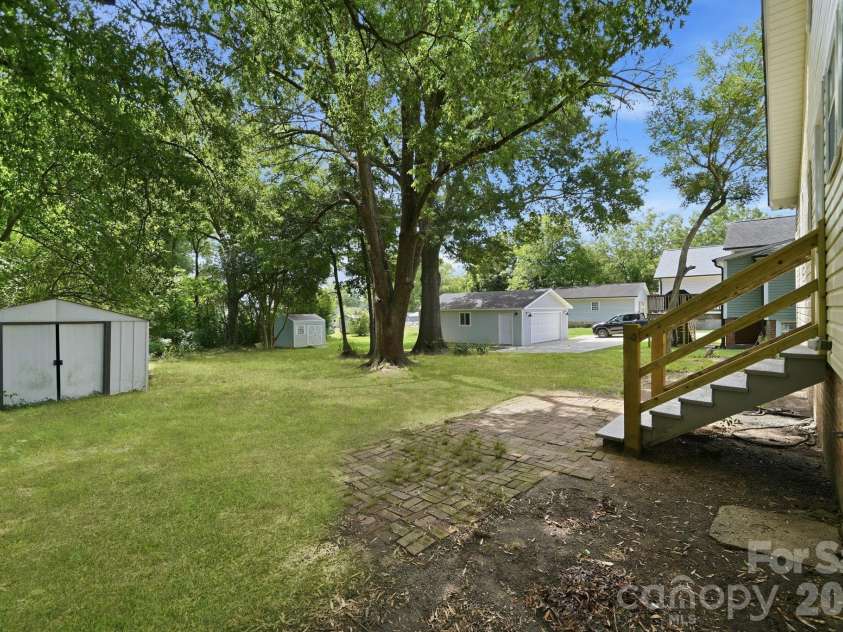 206 Ridge Avenue, Kannapolis, NC 28083.  MLS# CAR4404212, YatesRealty ID 37630. Backyard with Endless Possibilities!