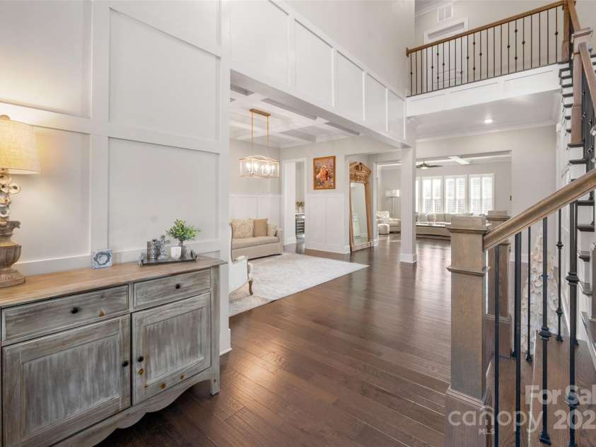 105 Downton Abbey Drive, Marvin, NC 28173.  MLS# CAR4332508, YatesRealty ID 3764. 2 story foyer and hardwoods throughout the main, stairs, upper hall and primary bedroom