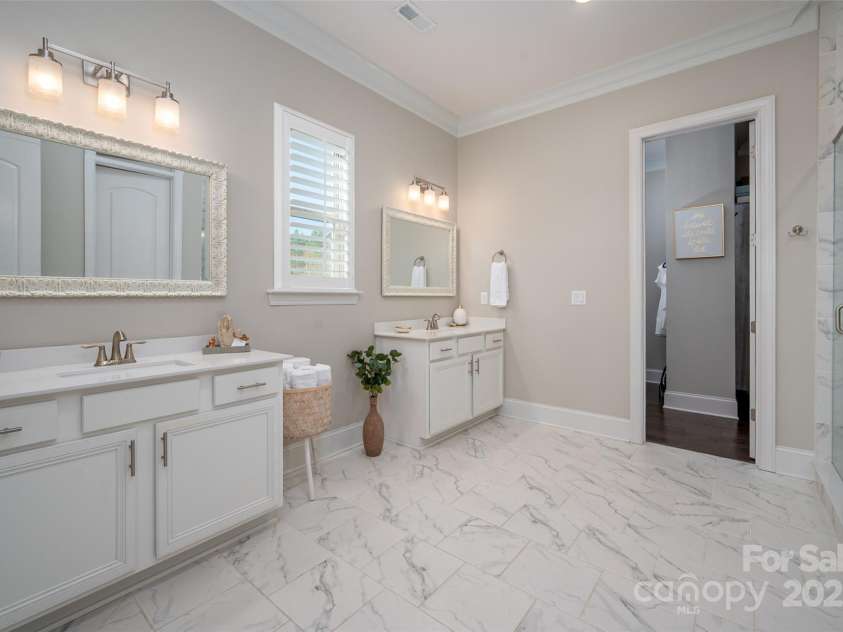 105 Downton Abbey Drive, Marvin, NC 28173.  MLS# CAR4332508, YatesRealty ID 3764. 2nd primary full bath with dual vanities and lg shower