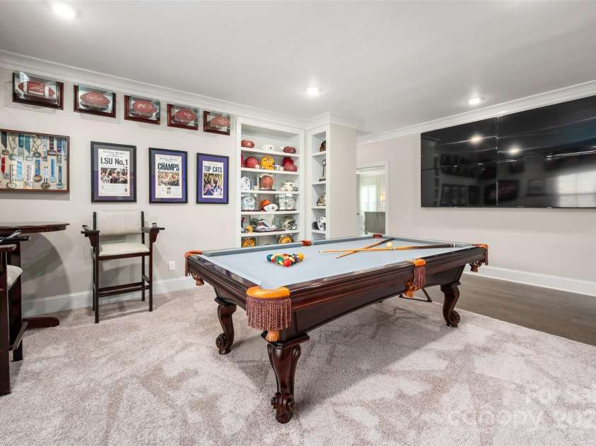 105 Downton Abbey Drive, Marvin, NC 28173.  MLS# CAR4332508, YatesRealty ID 3764. Bonus room wired for multiple screens.  (tv's do not convey)