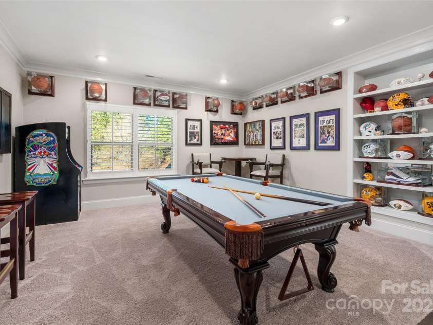 105 Downton Abbey Drive, Marvin, NC 28173.  MLS# CAR4332508, YatesRealty ID 3764. Bonus room with display shelves