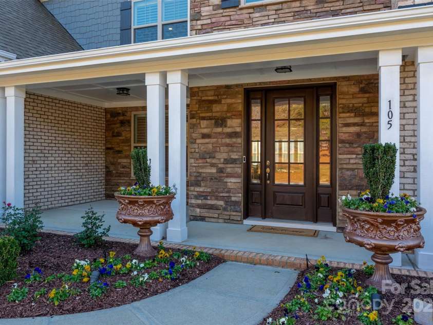 105 Downton Abbey Drive, Marvin, NC 28173.  MLS# CAR4332508, YatesRealty ID 3764. Covered front porch