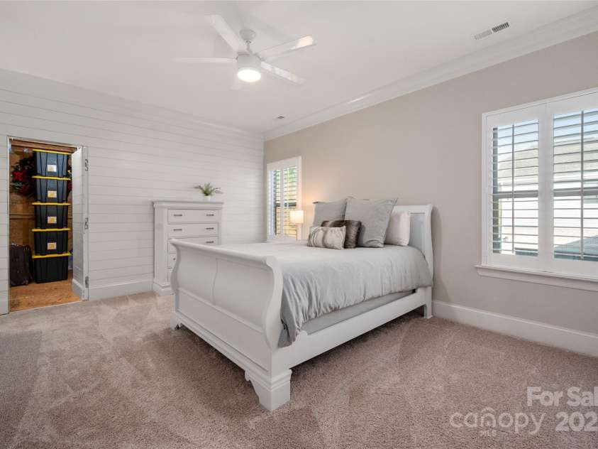 105 Downton Abbey Drive, Marvin, NC 28173.  MLS# CAR4332508, YatesRealty ID 3764. Guest Ste/BR #5 offers hidden access to walk in strorage