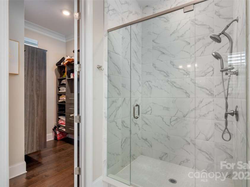 105 Downton Abbey Drive, Marvin, NC 28173.  MLS# CAR4332508, YatesRealty ID 3764. Large step in shower