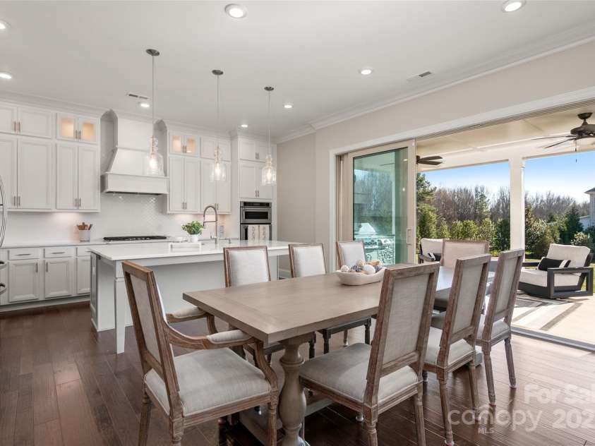 105 Downton Abbey Drive, Marvin, NC 28173.  MLS# CAR4332508, YatesRealty ID 3764. Telescoping door brings the indoors to the outside.