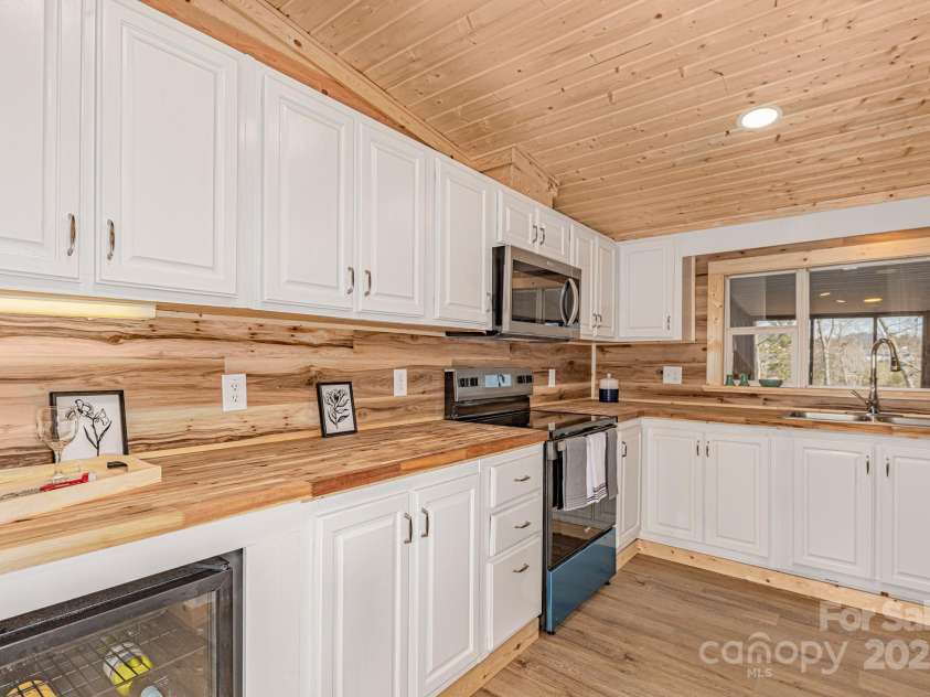 459 Vaughn Road, Spruce Pine, NC 28777.  MLS# CAR4240761, YatesRealty ID 3764. New butcher block countertops and appliances