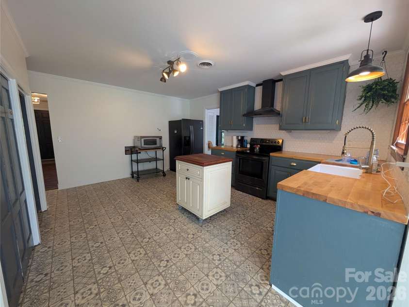 571 Piedmont Road, Rutherfordton, NC 28139.  MLS# CAR4402095, YatesRealty ID 37645. Back wall has laundry hookups