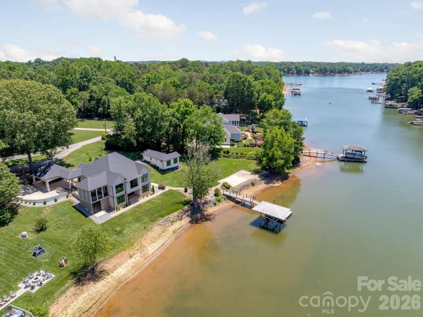 445 Sundown Road, Mooresville, NC 28117.  MLS# CAR4389799, YatesRealty ID 37649. Waterfront enjoyment with dock and paddleboard launch