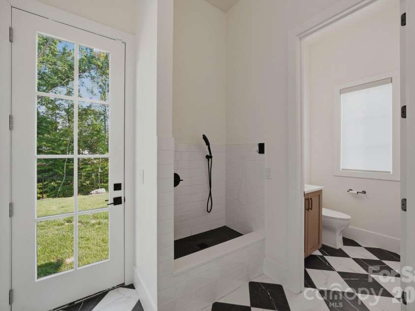 207 Sugar Maple Lane, Weddington, NC 28104.  MLS# CAR4388585, YatesRealty ID 37659. Dog Shower