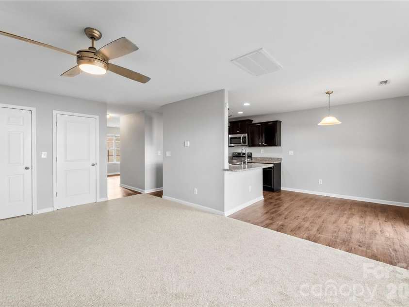 5305 Park Brook Drive, Charlotte, NC 28269.  MLS# CAR4336100, YatesRealty ID 3766. Kitchen entrance view from living room