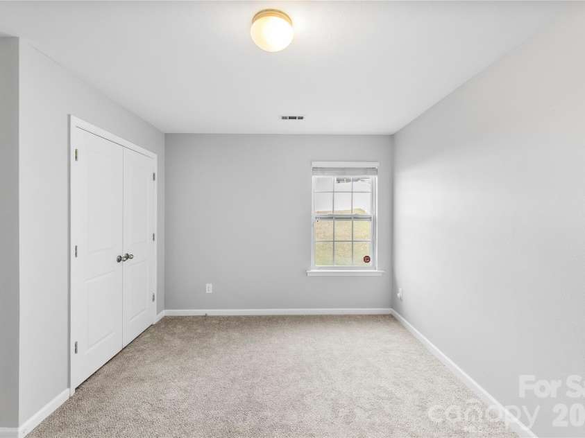 5305 Park Brook Drive, Charlotte, NC 28269.  MLS# CAR4336100, YatesRealty ID 3766. Main floor bedroom w/walkin closet