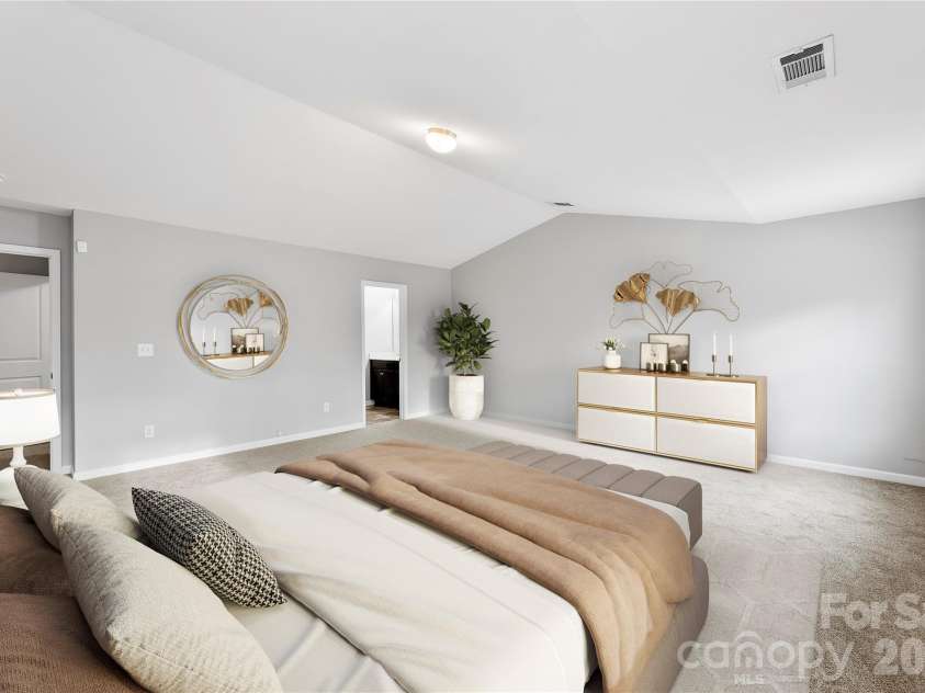 5305 Park Brook Drive, Charlotte, NC 28269.  MLS# CAR4336100, YatesRealty ID 3766. Staged Primary Bedroom w/vaulted Ceilings